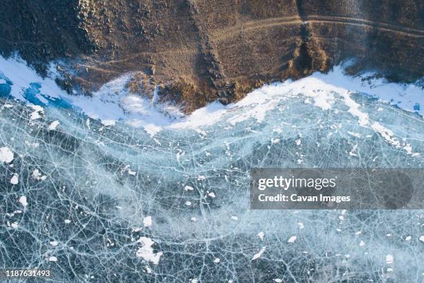 small island ice sorrounded from aerial view - siberia stock pictures, royalty-free photos & images