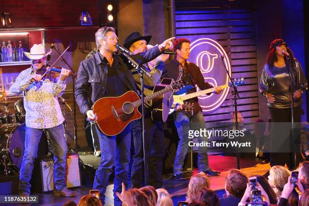 Blake Shelton and Garth Brooks perform onstage during the 53rd annual CMA Awards at the Bridgestone Arena on November 13, 2019 in Nashville,...