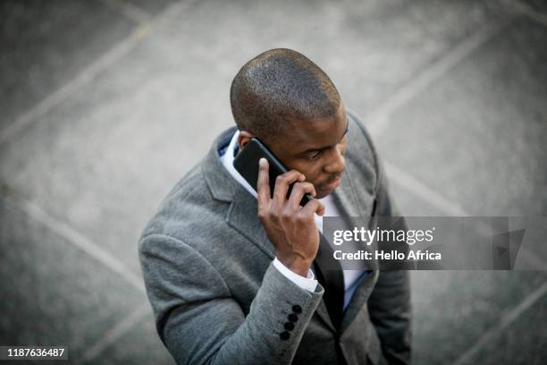 Businessman talking on his phone shot from above