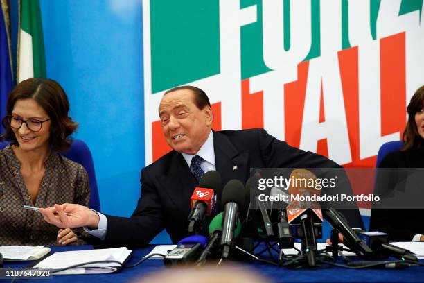 Italian politicians Silvio Berlusconi and Mariastella Gelmini, members of the Forza Italia party, during the No Tasse e Manette press conference in...