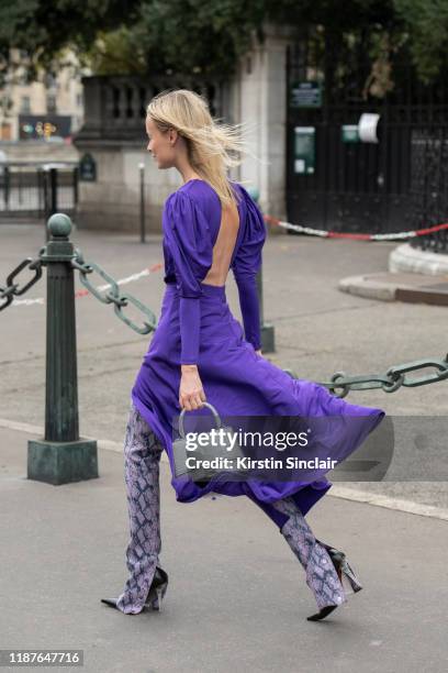 Stylist and creative director Thora Valdimars wears a Rotate dress, Balenciaga bag, Staud trousers and Vetements boots on September 26, 2019 in...