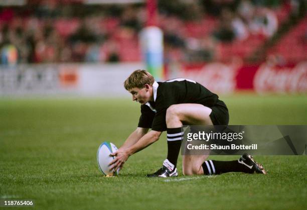 Andrew Mehrtens of New Zealand prepares to take a kick during a Rugby World Cup pool stage match against Ireland at Ellis Park, Johannesburg, South...