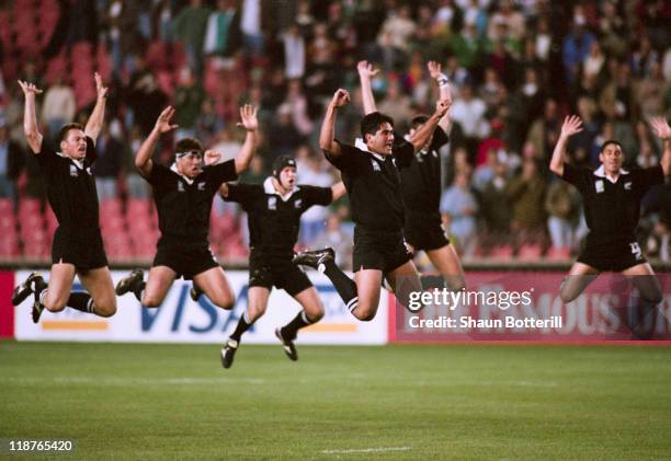 The New Zealand team perform their traditional haka before a Rugby World Cup pool stage match against Ireland at Ellis Park, Johannesburg, South...