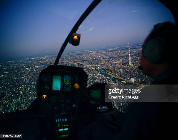 tokyo at night from a helicopter - helicopter night stock pictures, royalty-free photos & images