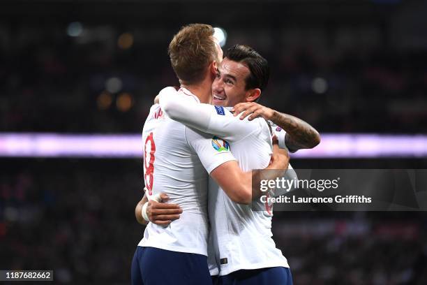 Harry Kane of England celebrates after scoring his sides third goal with Ben Chilwell during the UEFA Euro 2020 qualifier between England and...
