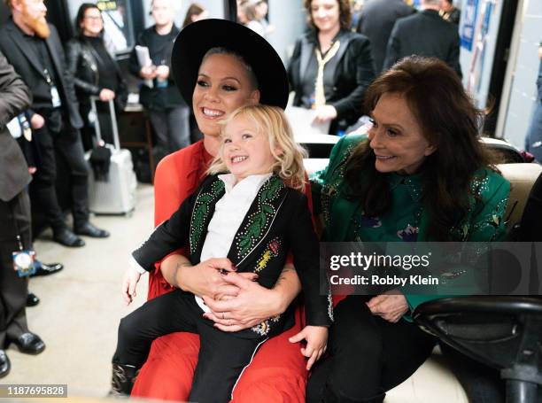 Nk, Jameson Hart and Loretta Lynn backstage during the 53rd annual CMA Awards at Bridgestone Arena on November 13, 2019 in Nashville, Tennessee.