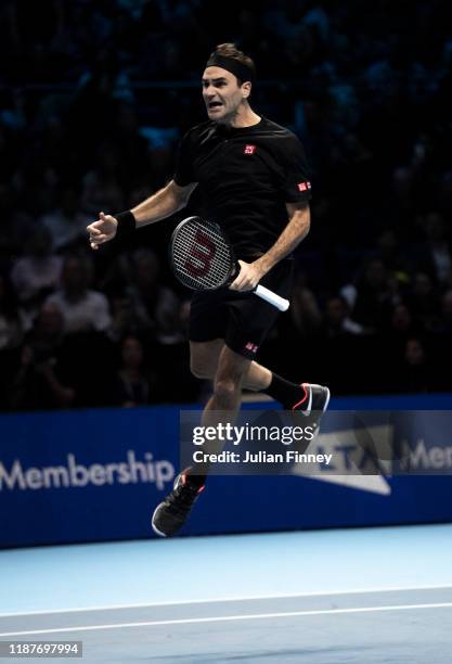 Roger Federer of Switzerland celebrates match point in his singles match against Novak Djokovic of Serbia during Day Five of the Nitto ATP Finals at...