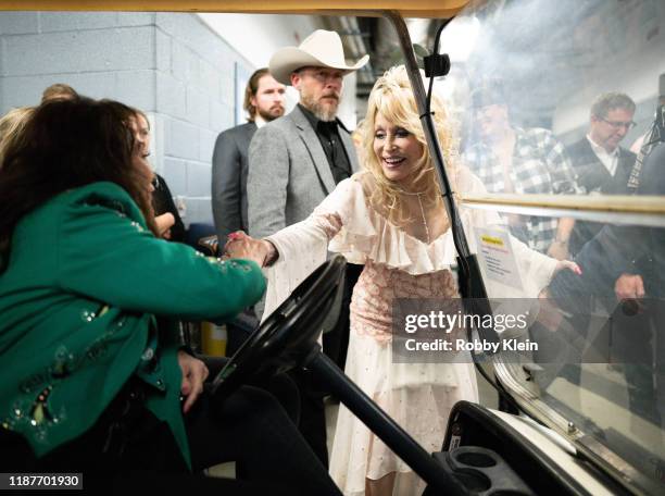 Loretta Lynn and Dolly Parton backstage at the 53rd annual CMA Awards at Bridgestone Arena on November 13, 2019 in Nashville, Tennessee.