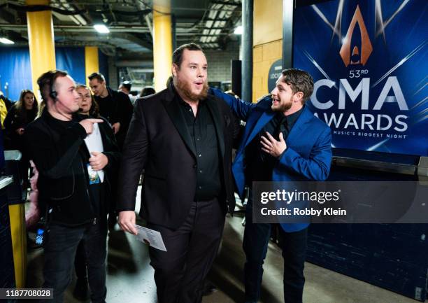 Luke Combs and Robert Williford backstage at the 53rd annual CMA Awards at Bridgestone Arena on November 13, 2019 in Nashville, Tennessee.