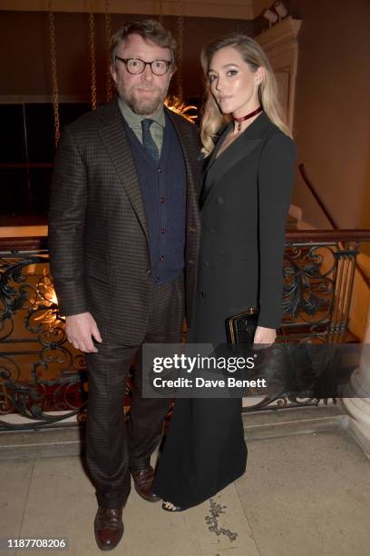 Guy Richie and Jacqui Ritchie attend the UK Premiere of 'Very Ralph' at Royal Academy of Arts on November 14, 2019 in London, England.