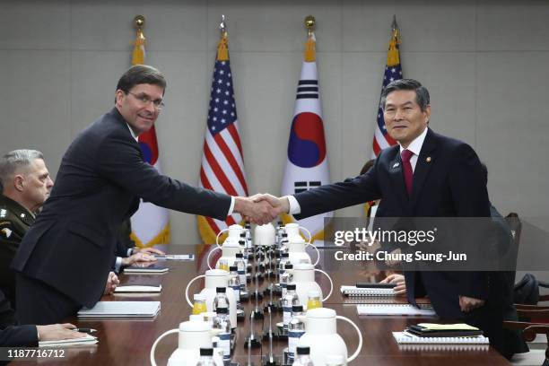 Defense Secretary Mark Esper shakes hands with South Korean Defense Minister Jeong Kyeong-doo during their meeting on November 15, 2019 in Seoul,...