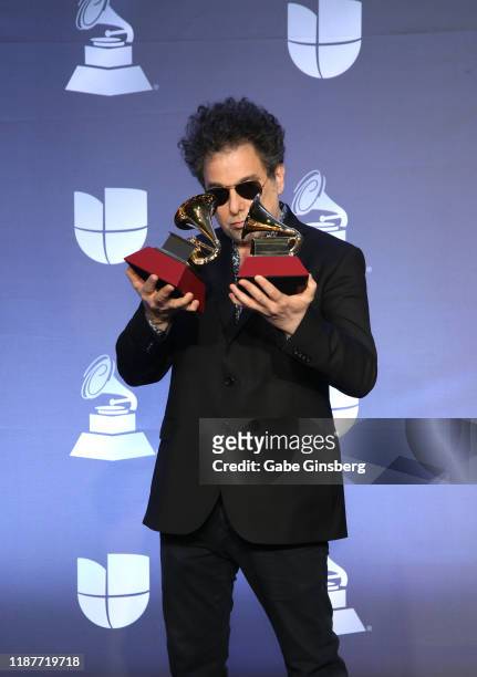 Andrés Calamaro, winner of Best Rock Song and Best Pop/ Rock Album awards, poses in the press room during the 20th annual Latin GRAMMY Awards at MGM...