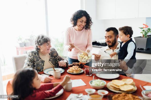 christmas family dinner in mexico - mexican food party stock pictures, royalty-free photos & images