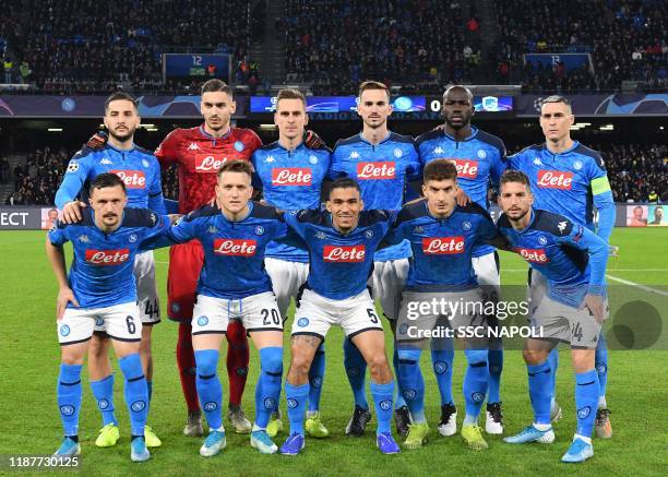 Napoli line up for a group photograph during the UEFA Champions League group E match between SSC Napoli and KRC Genk at Stadio San Paolo on December...