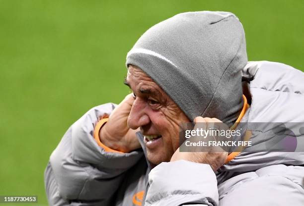 Galatasaray's Turkish coach Fatih Terim gestures during a training session at the Parc des Princes stadium in Paris on December 10, 2019 on the eve...