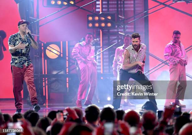 Residente and Ricky Martin perform onstage during the 20th annual Latin GRAMMY Awards at MGM Grand Garden Arena on November 14, 2019 in Las Vegas,...