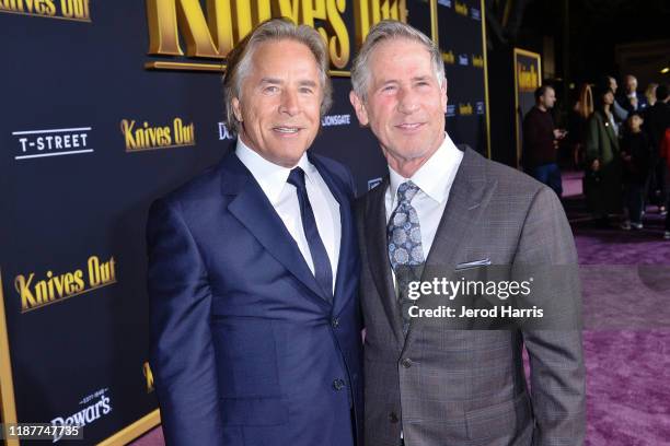 Don Johnson and Jon Feltheimer arrive at the Premiere of Lionsgate's 'Knives Out' at Regency Village Theatre on November 14, 2019 in Westwood,...