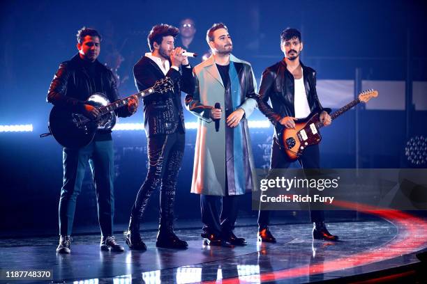 Sebastián Yatra performs onstage alongside Reik during the 20th annual Latin GRAMMY Awards at MGM Grand Garden Arena on November 14, 2019 in Las...