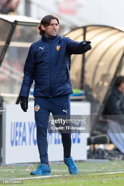 Head coach Miguel Angel Angulo of FC Valencia U19 gestures during the UEFA Youth League match between Ajax Amsterdam U19 and FC Valencia U19 on...