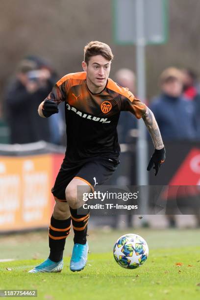 Xavi Estacio of FC Valencia U19 controls the ball during the UEFA Youth League match between Ajax Amsterdam U19 and FC Valencia U19 on December 10,...