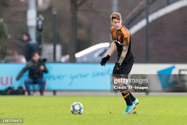 Xavi Estacio of FC Valencia U19 controls the ball during the UEFA Youth League match between Ajax Amsterdam U19 and FC Valencia U19 on December 10,...