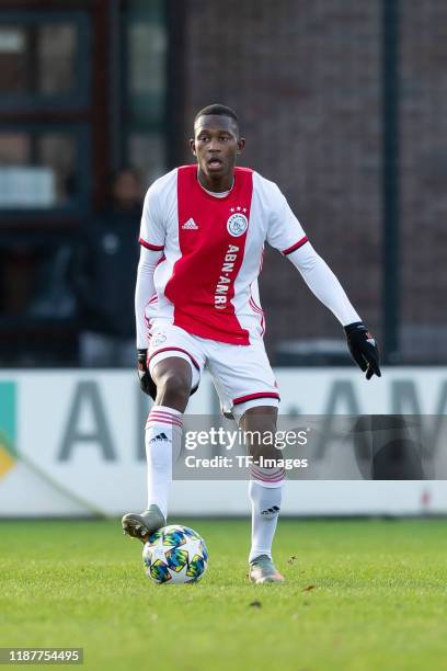 Neraysho Kasanwirjo of Ajax Amsterdam U19 controls the ball during the UEFA Youth League match between Ajax Amsterdam U19 and FC Valencia U19 on...
