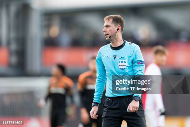 Referee Giorgi Kruashvili looks on during the UEFA Youth League match between Ajax Amsterdam U19 and FC Valencia U19 on December 10, 2019 in...