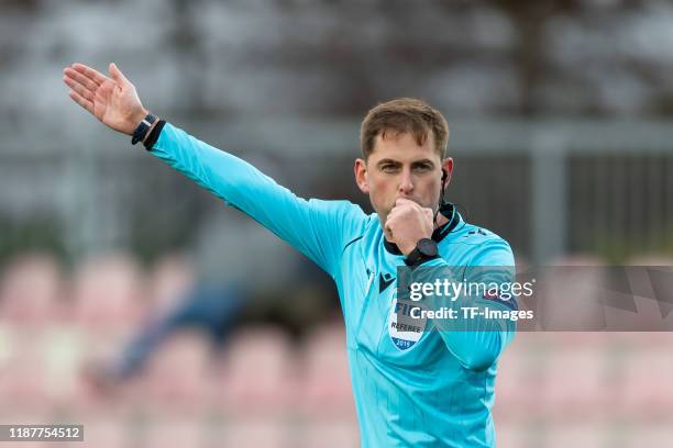 Referee Giorgi Kruashvili gestures during the UEFA Youth League match between Ajax Amsterdam U19 and FC Valencia U19 on December 10, 2019 in...