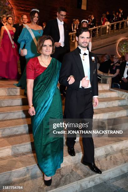 Prince Carl Philip of Sweden and FrenchAmerican economist Esther Duflo, co-laureate of the Sveriges Riksbank Prize in Economic Sciences in Memory of...