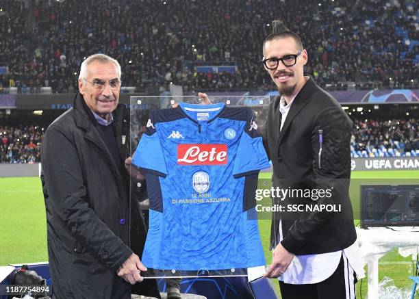 Marek Hamsik and Eddy Reja during the UEFA Champions League group E match between SSC Napoli and KRC Genk at Stadio San Paolo on December 10, 2019 in...