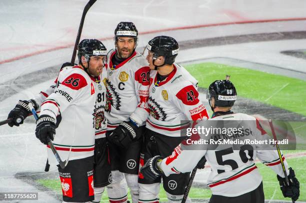 Ryan Lasch of Frolunda HF celebrates his goal with teammates during the second quarter-finals game between EHC Biel-Bienne and Frolunda Indians at...