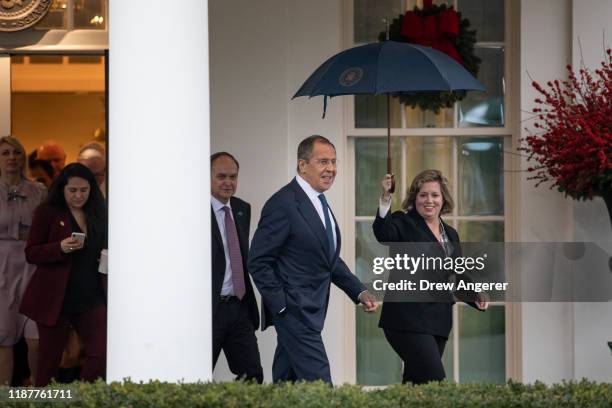 Russian Foreign Minister Sergey Lavrov exits the West Wing of the White House following a Oval Office meeting with U.S. President Donald Trump on...