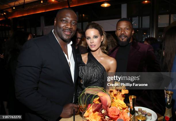 Adewale Akinnuoye-Agbaje, Kate Beckinsale, and Jamie Foxx attend the Hollywood Foreign Press Association and The Hollywood Reporter Celebration of...