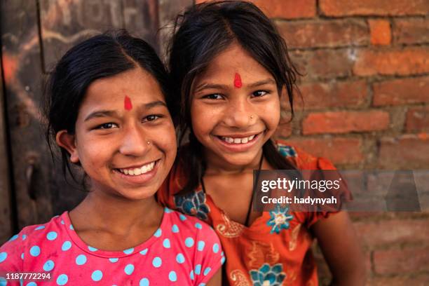 happy indian girls - nepal road stock pictures, royalty-free photos & images