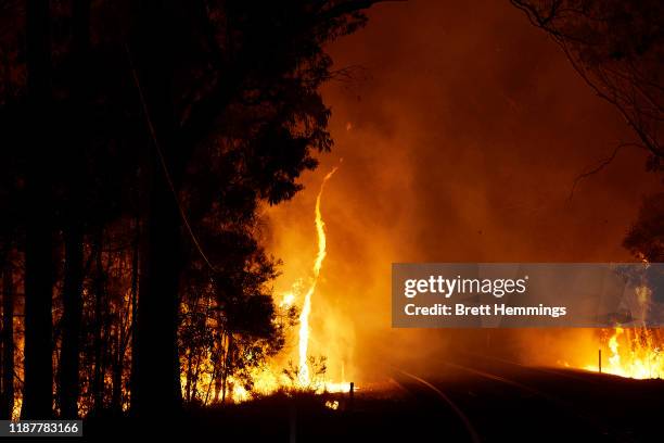 Bushfire is seen along Putty Road on November 15, 2019 in Colo Heights, Australia. The warning has been issued for a 80,000-hectare blaze at Gospers...