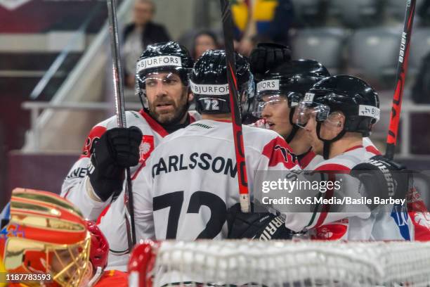 Patrik Carlsson of Frolunda HF celebrates his goal with teammates during the second quarter-finals game between EHC Biel-Bienne and Frolunda Indians...