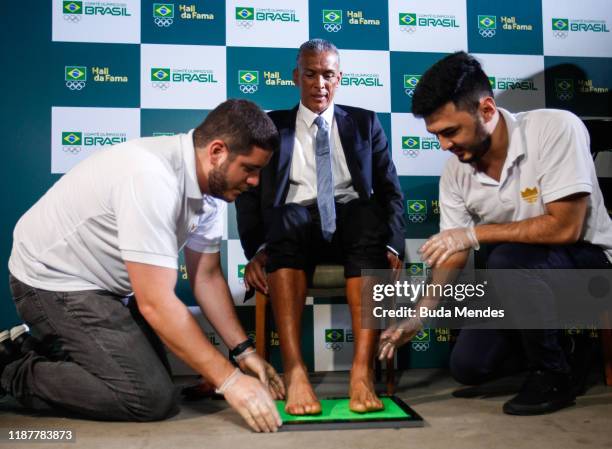 Former Brazilian Half-Founder, 800-meter Olympic Champion in Los Angeles 1984 Joaquim Cruz makes his mark at the Brazilian Olympic Committee Hall of...