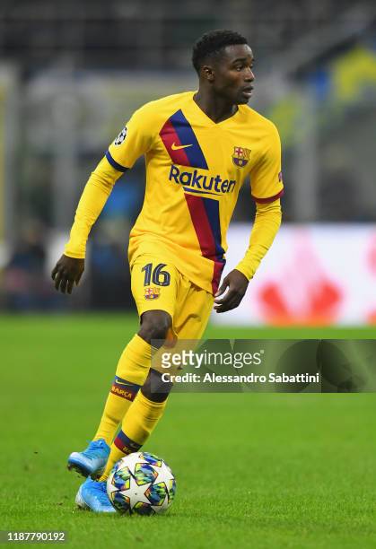 Moussa Wagué of FC Barcelona in action during the UEFA Champions League group F match between Inter and FC Barcelona at Giuseppe Meazza Stadium on...