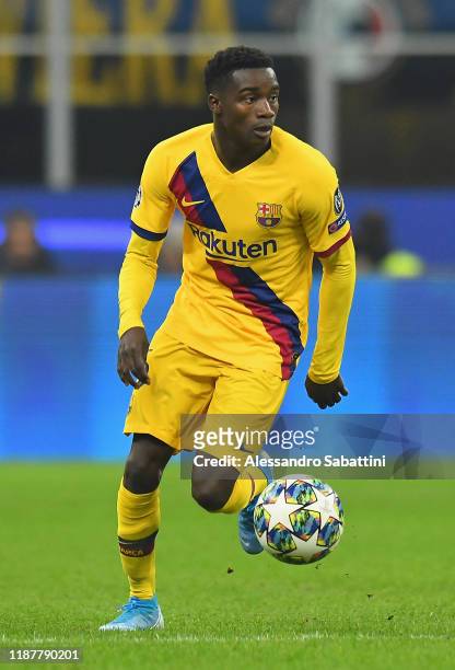 Moussa Wagué of FC Barcelona in action during the UEFA Champions League group F match between Inter and FC Barcelona at Giuseppe Meazza Stadium on...