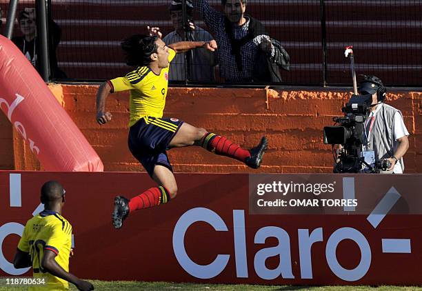 Colombian forward Radamel Falcao celebrates after scoring against Bolivia, during a 2011 Copa America Group A first round football match, at the...