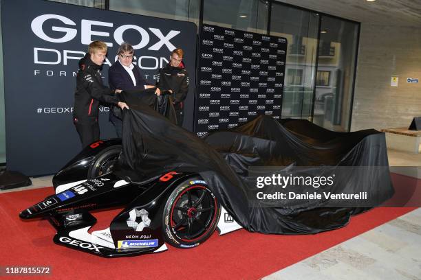 Nico Müller, Mario Moretti Polegato, founder of the Geox and Brandon Hartley attends the Geox Dragon Formula E car launch on November 15, 2019 in...