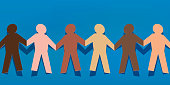 Symbol of solidarity between peoples with paper characters of different colors that hold hands.