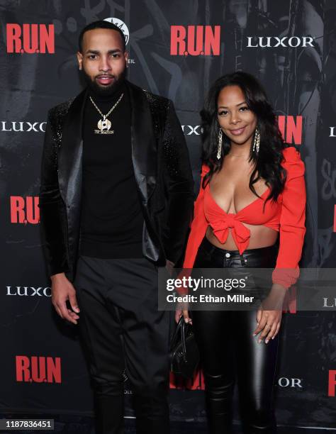 Dinero and Yanira Pache attend the grand opening night for "R.U.N - The First Live Action Thriller" presented By Cirque du Soleil at Luxor Hotel and...