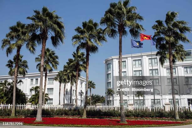 Vietnam flag flies outside the Vingroup JSC headquarters in Hanoi, Vietnam, on Thursday, Dec. 5, 2019. Vingroup JSC Chairman Vuong, the billionaire...