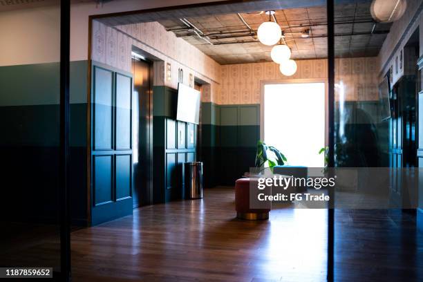 empty elevator hall in an office - open elevator stock pictures, royalty-free photos & images