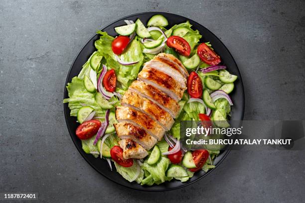 mediterranean grilled chicken salad - grilled chicken stock pictures, royalty-free photos & images