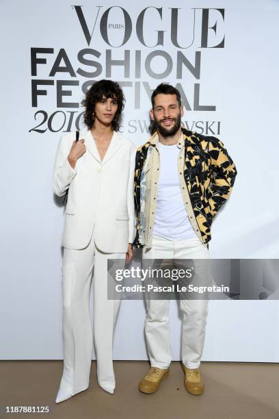 Mica Arganaraz and Simon Porte Jacquemus attend Vogue Fashion Festival Photocall At Hotel Potocki In Paris on November 15, 2019 in Paris, France.