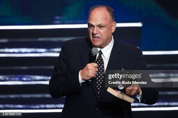 Former Brazilian basketball player, considered one of the greatest basketball players of all time, Oscar Daniel Bezerra Schmidt receives the trophy...