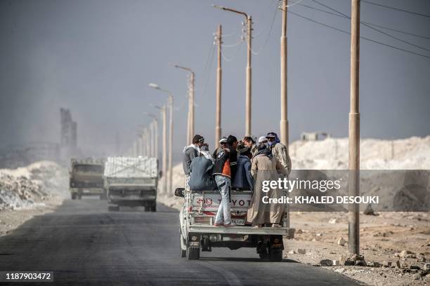 Labourers are pictured at the "White Mountain" limestone extraction quarry site near Egypt's southern city of Minya, some 265 kilometres south of the...