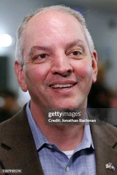 Gov. John Bel Edwards talks to media at the Case Closed Barbershop on November 15, 2019 in New Orleans, Louisiana. Louisiana residents head to the...